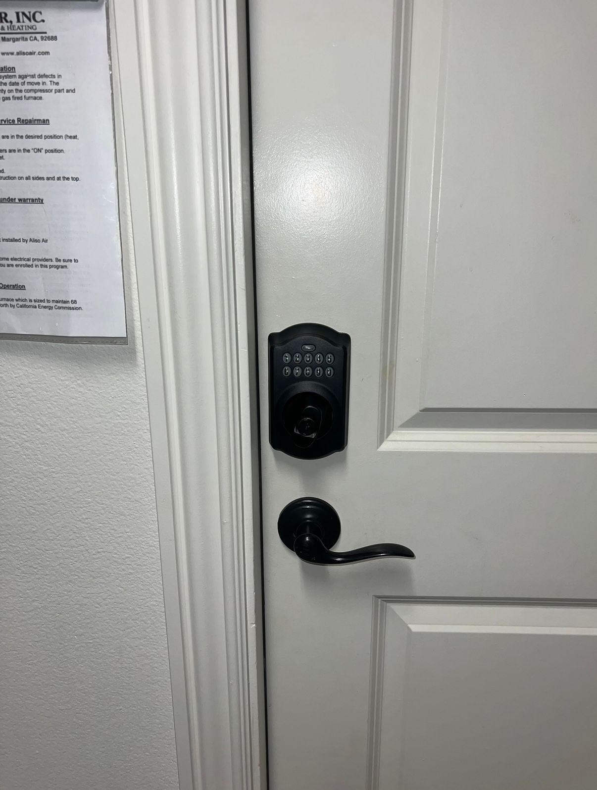 Schlage black keypad deadbolt interior — smart lock install job by OH Lock and Key Solutions, Orange County (BSIS #8663)