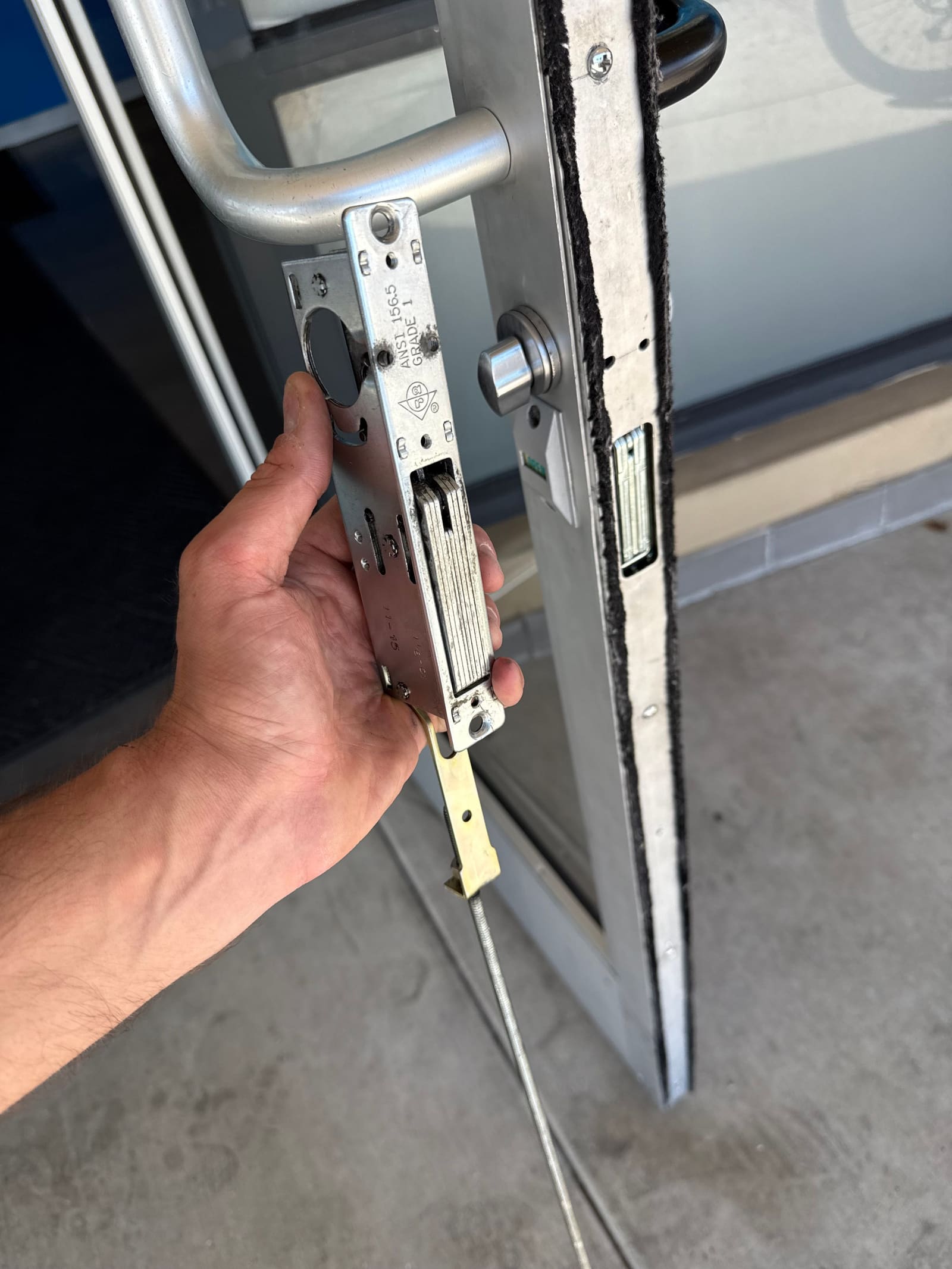 Adams rite mortise lock body replacement — storefront door job by OH Lock and Key Solutions, Orange County (BSIS #8663)